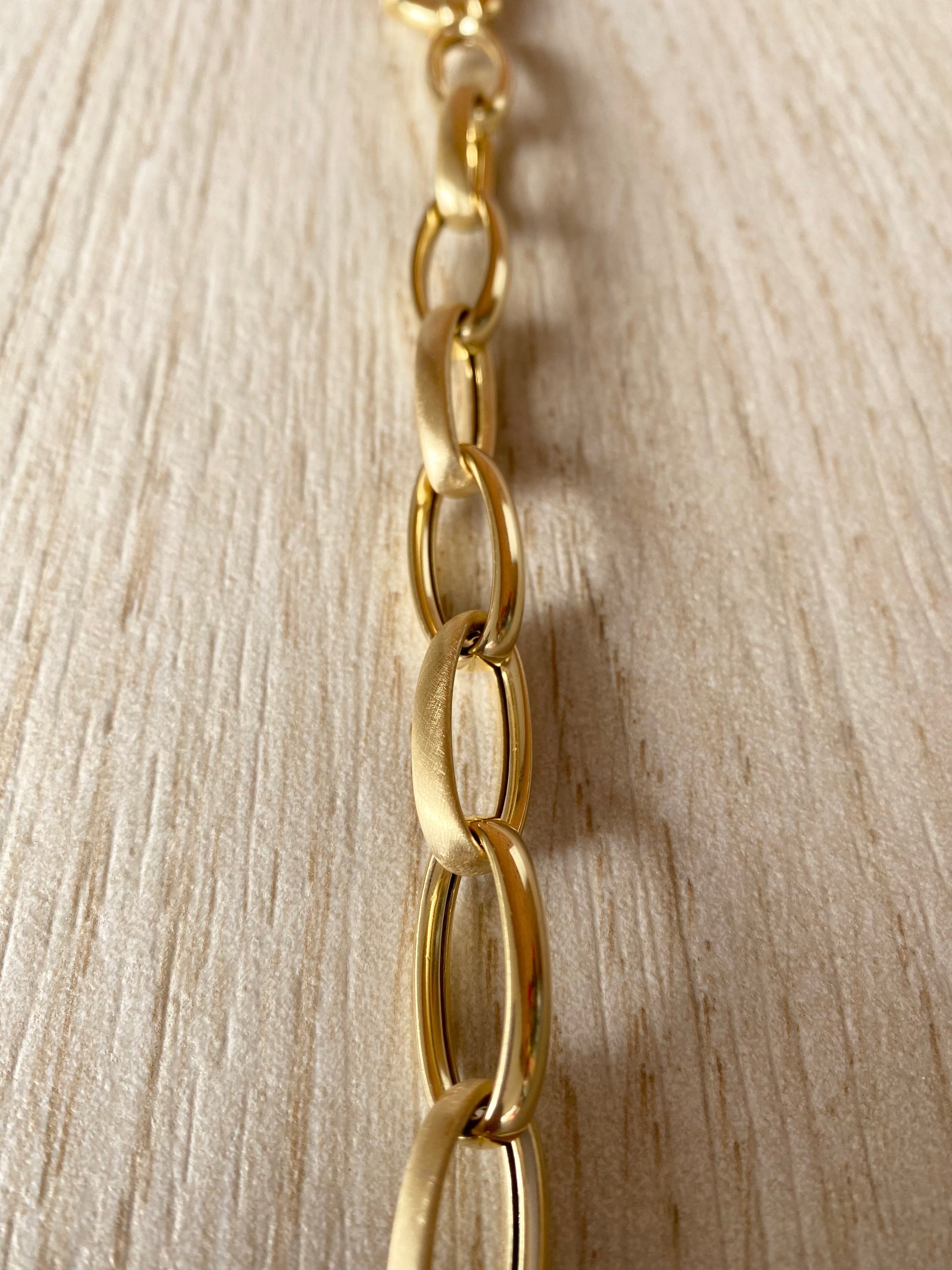 Bracciale in argento placcato oro giallo a maglia rollò lucida e satinata alternate