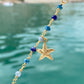 Bracciale marinaro in argento giallo, pietre multicolors semipreziose e tre ciondoli : conchiglia, cavalluccio marino e stella marina