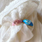 Anelli in argento smaltato rosa o celeste con zircone centrale colorato a forma di cuore