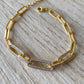 Bracciale maglia rollò in argento placcato oro giallo e zirconi centrali